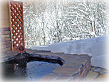 雪の貸切露天風呂「ホタルの庭園」